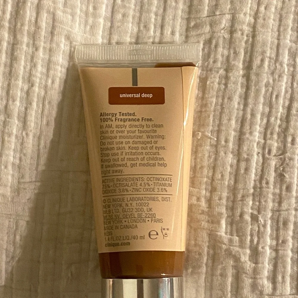 Clinique Moisture Surge Sheertint Hydrator Broad Spectrum SPF 25 Universal Deep